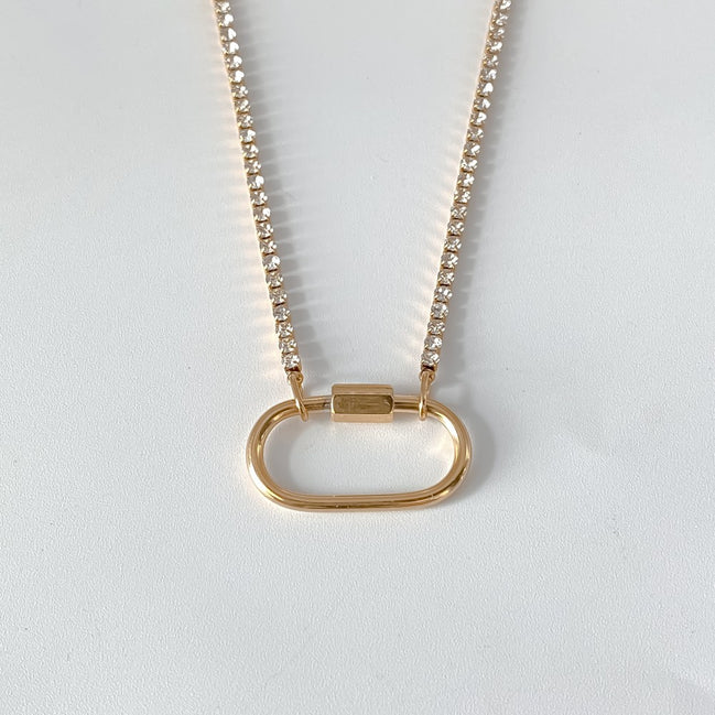 Ayla Clasp Necklace in gold tone featuring pearl accent