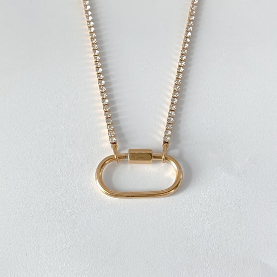 Ayla Clasp Necklace in gold tone featuring pearl accent