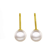 Elara Pearl Drop Studs in gold tone featuring pearl accent