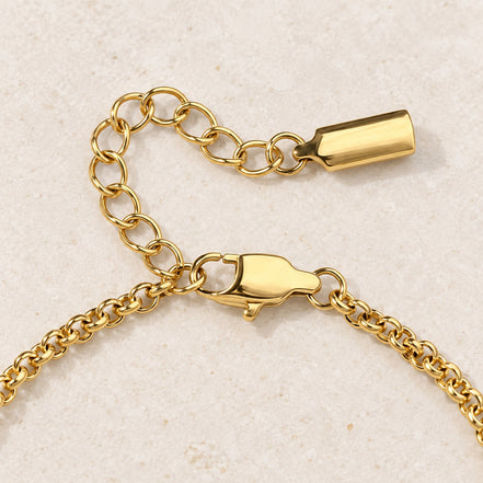 Celia Link Bracelet — gold lobster clasp and extension detail; AI-generated supporting image.