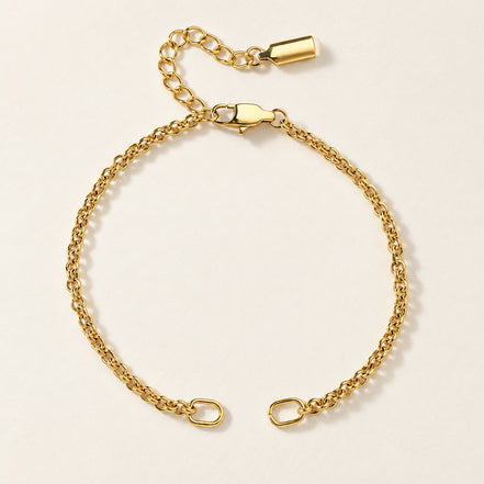 Celia Link Bracelet in gold — full open-ended product presentation; AI-generated supporting image.