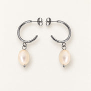 Elara Silver Pearl Drops — clean product presentation; AI-generated supporting image.
