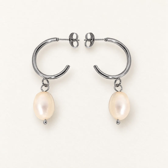 Elara Silver Pearl Drops — clean product presentation; AI-generated supporting image.