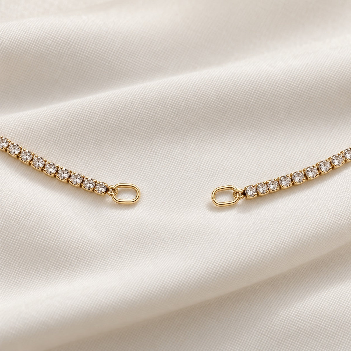 Rhea Link Necklace — ends detail, gold with clear round stones; AI-generated supporting image.