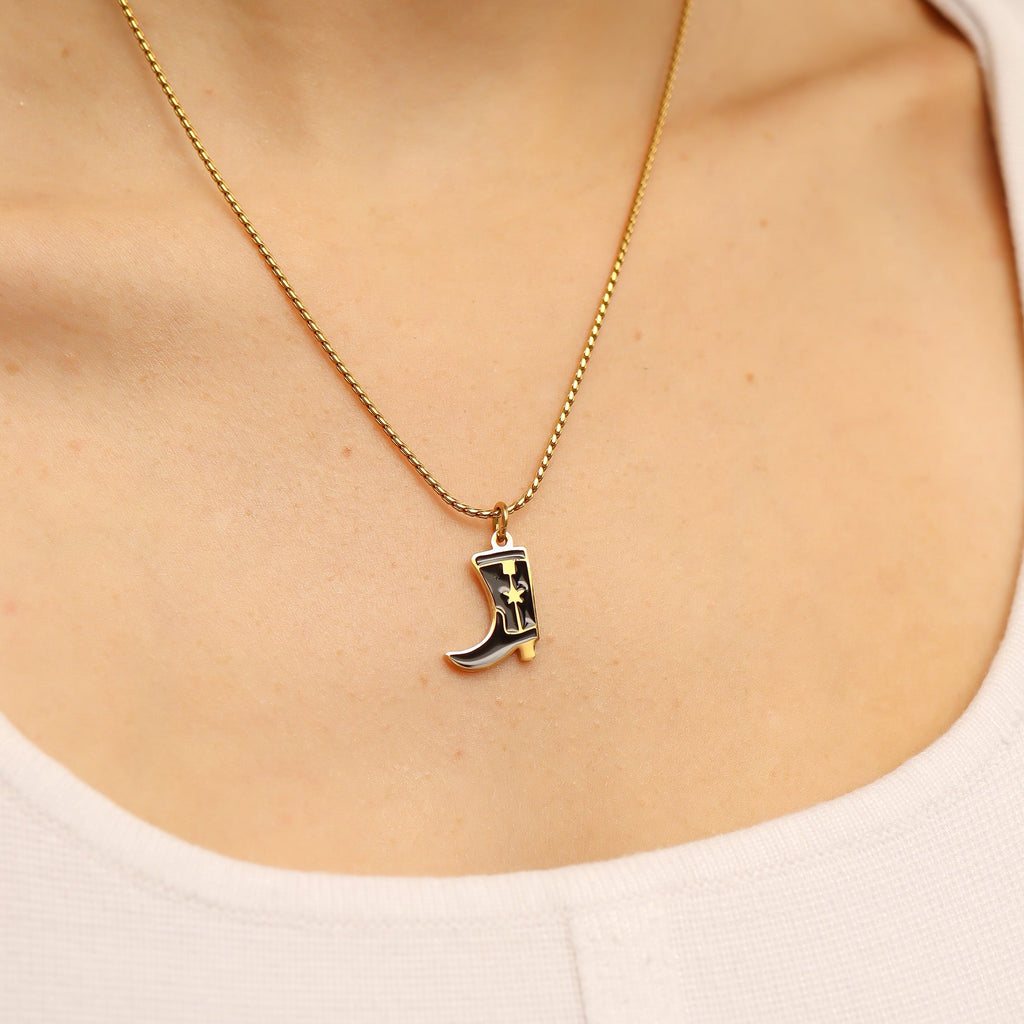 Cowboy boot charm on a charm