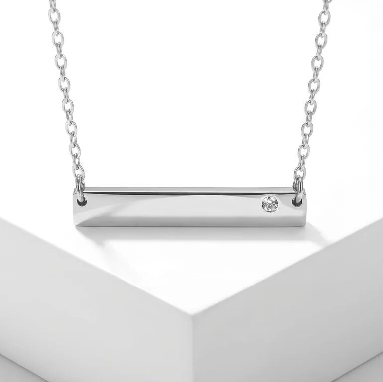 Silver necklace with a bar pendant on a white background